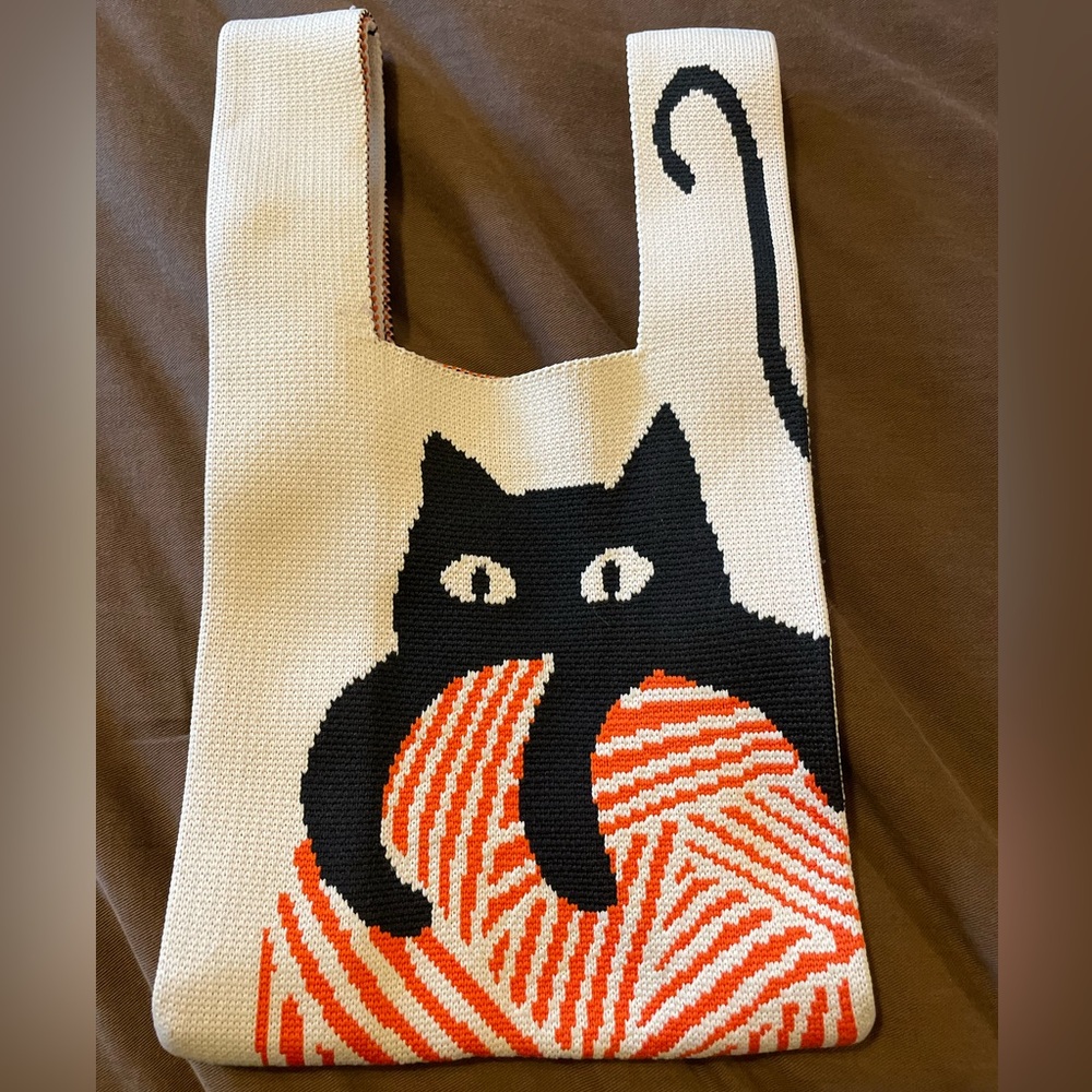 black kitten knitted mini purse